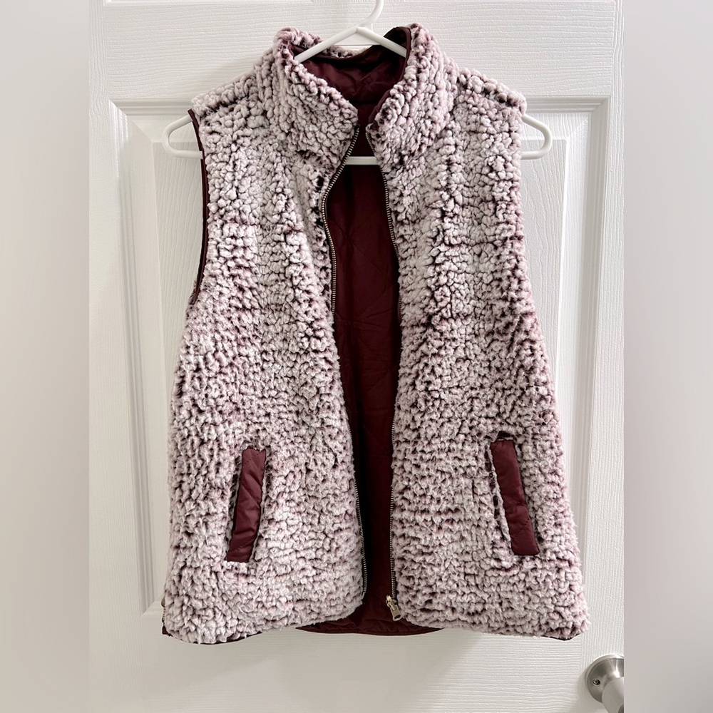 Fransesca’s reversible maroon Sherpa winter vest
